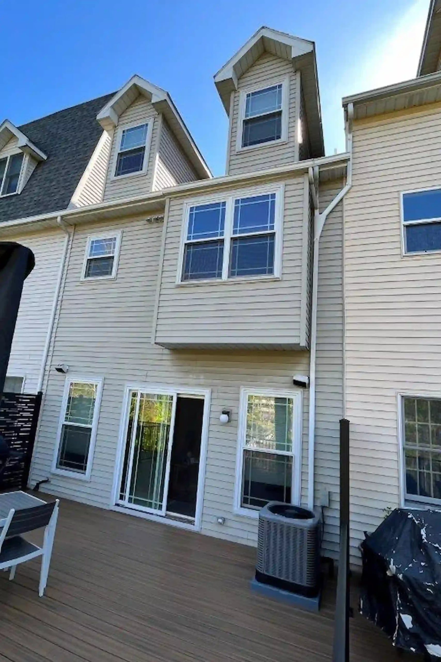 townhome with old tan james hardie siding before exterior armor did any work