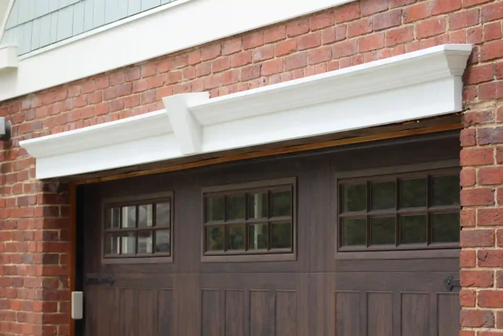 new wood look garage door in deep brown recently installed