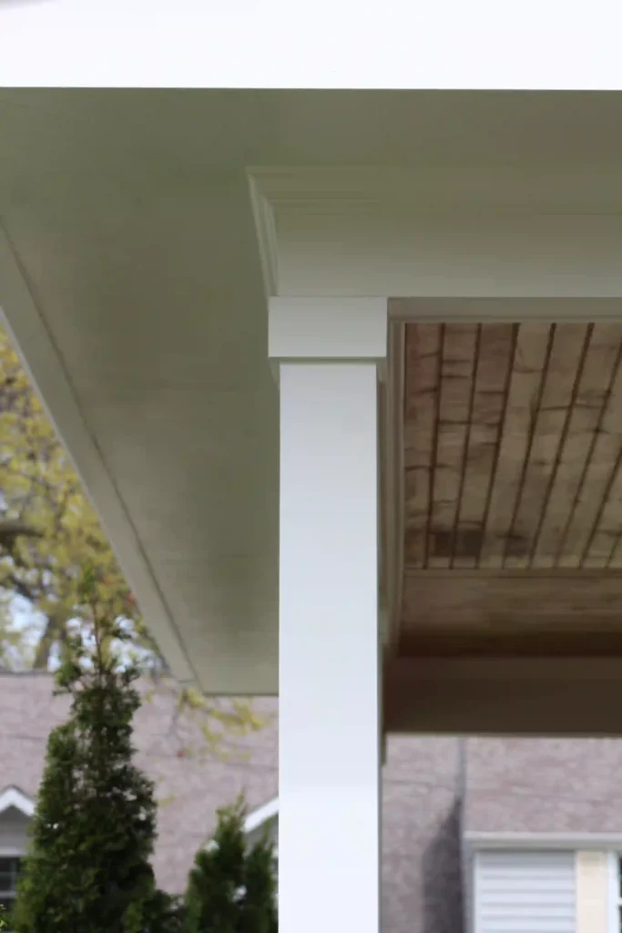 patio pillar close up showing new vinyl siding