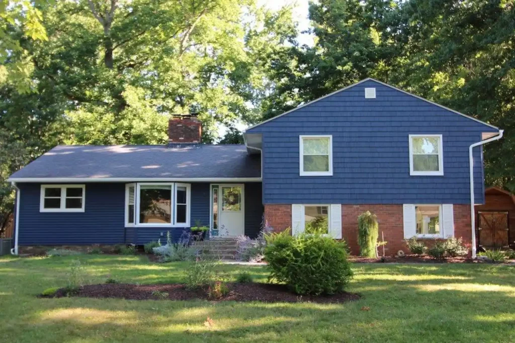 home with brand new blue vinyl siding showing exterior armors good work